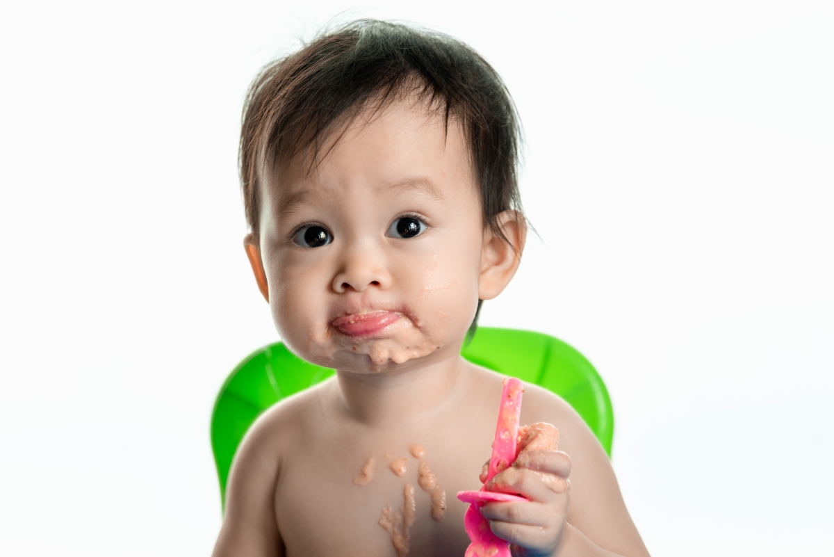 Messy kid with popsicle