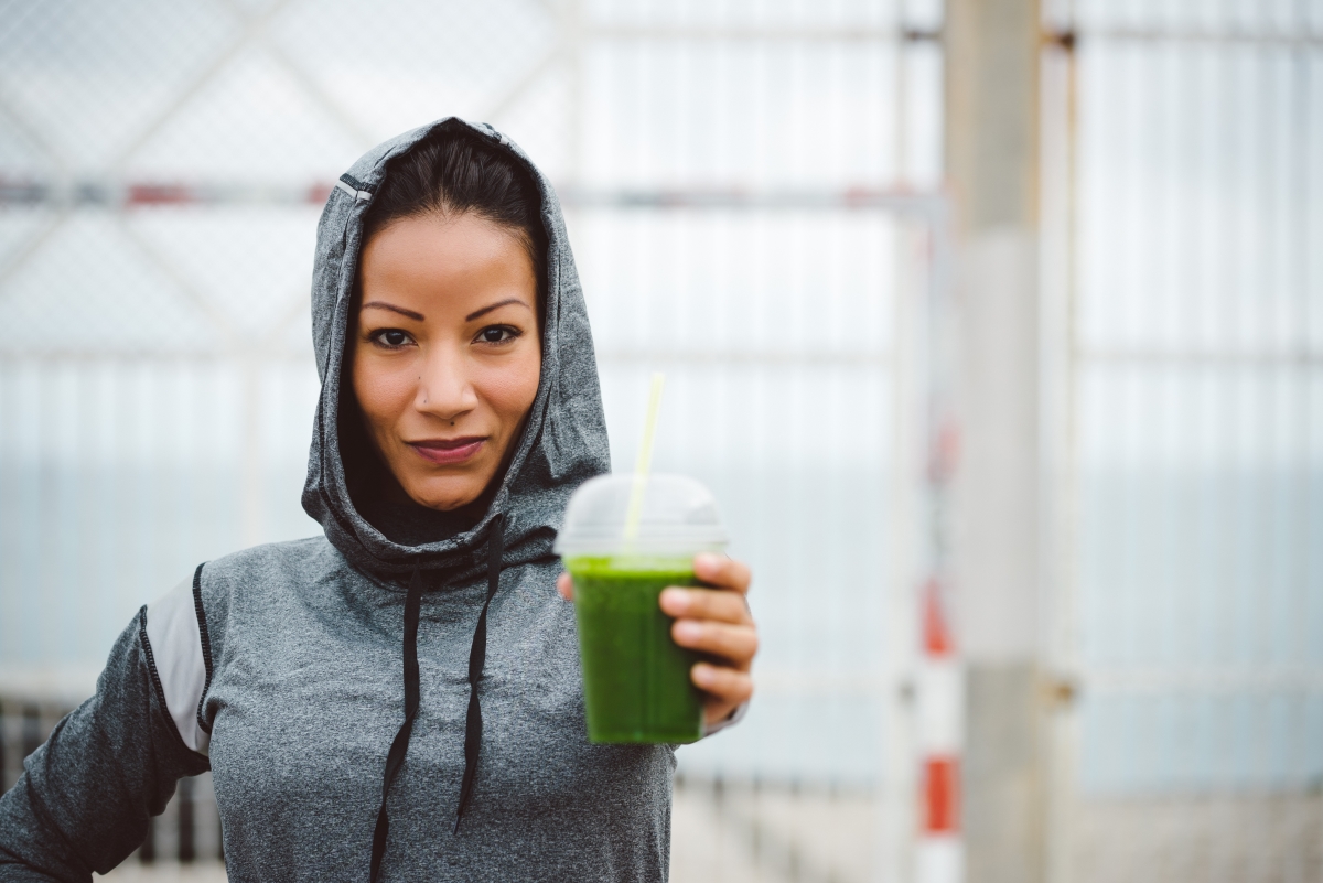 Jogger with smoothie