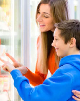 Mother and son at fridge